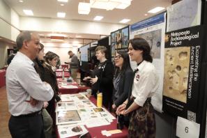President Michael Khan and Dr. Sveva Savelli at Research Expo